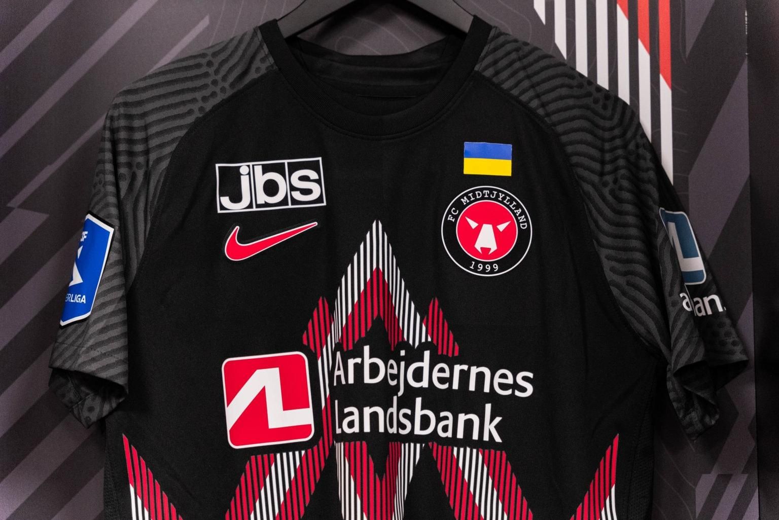 Футболка Мітьюлланда Футболка Мітьюлланда